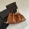 2025 Bolso de Mujer Plisado de Moda Estilo Coreano Bolso Tote de Axila Calidad Europea y Americana Piel de Cera de Aceite Bolso de Hombro para Viajes Versátil