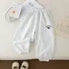 Pantalones de Chándal Bordados de Primavera Nuevos Estilo Coreano para Niños, Pantalones Nuevos de Moda con Puños para Niños y Niñas