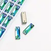 Fábrica de Rhinestones de Vidrio de Color K9 de Alta Calidad en Tira Larga AB, Rhinestones de Doble Agujero para Ropa DIY, Accesorios de Joyería de Forma Irregular
