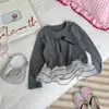 Camiseta base de lunares para niña 2026 Nuevo estilo de otoño Malla con volantes en el dobladillo Manga larga Dulce top para niñas