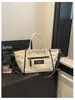 Bolsa de lona estampada de grande capacidade, bolsa tote versátil para mulheres, novo modelo de verão, bolsa de ombro de aparência sofisticada, bolsa transversal moderna