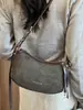 Bolso de mano pequeño de alta gama para mujer, nuevo bolso cruzado versátil de moda 2026, bolso de hombro popular de venta caliente, bolso tipo silla de montar súper moderno
