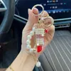 Nova Corrente de Pérolas Liga de Pérola Diamante Chaveiro de Batom Versão Coreana Criativo Chaveiro de Carro Pingente de Bolsa Atacado