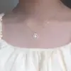 Colar de garra Yao Meng feminino acessórios antigos estilo doce Mori Coringa fofo namoradas 2024 novo atacado