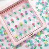 Decorações de unhas florais de cor sólida, com tema de primavera e versáteis, apresentando designs delicados e tridimensionais de folhas e flores, adequadas para esmalte, capas de celular e artesanato em resina.
