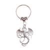 Ins joyería transfronteriza viejo dibujo animado dragón llavero colgante bolsa pantalones todo vale colgante para teléfono móvil accesorios