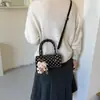 Bolsa de poá nicho super popular estilo coreano para mulheres, nova bolsa transversal versátil e estilosa 2026, bolsa de mão requintada, bolsa cilíndrica