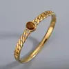 Pulsera Transfronteriza de Acero Inoxidable Europea y Americana Pulsera de Acero de Titanio Piedra Ojo de Tigre Pulsera de Pareja Simple Versátil Moderna Elegante Pulsera Abierta