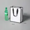 Bolsa de mano simple de cartón blanco, hecha a medida para ropa y regalos, impresión publicitaria universal, logotipo, personalización al por mayor de fábrica