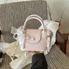 Bolso de Mano Pequeño Exquisito Súper Caliente para Salidas de Mujer 2026 Nuevo Verano Popular de Gama Alta para el Trabajo Bolso de Hombro Cruzado