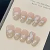 Ling Luo OriginalAtmosfera Super Feérica Desejo Puro Cor Nude Transparente Gilt Pérola Olho de Gato Unhas Vestíveis Feitas à Mão Venda por Atacado
