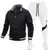 Conjunto de roupas esportivas casuais masculinas transfronteiriças, jaqueta com zíper e gola alta para primavera/outono e calça de moletom color-block, conjunto de duas peças de moda