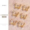 Joyería de uñas de mariposa de cristal rojo de internet, taladro de uñas tridimensional transparente como hielo, decoración de lazo de lujo súper brillante, venta al por mayor de fábrica