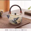 Montaña Roja Piedra de Fuego Esmalte Rojo Sueño de Dunhuang Mariposa Tetera de Cerámica Retro Olla Xishi Hogar Kung Fu Juego de Té Olla Individual