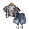 Verão 2026 Novo Comércio Exterior Conjunto de Três Peças Camisa Xadrez de Manga Curta para Meninos Macacão Casual de Shorts Jeans para Bebê Menino