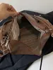 Mochila casual de gran capacidad para mujer 2026 nueva mochila para el trabajo bolsa de hombro cruzada de color liso elegante