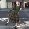 Saia feminina de lã xadrez, inverno retrô de cintura alta, saia rodada, saia em A forrada com fleece, saia de comprimento médio com um visual sofisticado