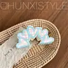 Pinza para el cabello Serie Chica Crema Floral Cuadros Agarre para el cabello Lazo Clip Acrílico Clip Tiburón Parte posterior de la cabeza Cabello