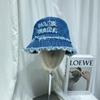 Sombrero de pescador con letras deshilachadas de mezclilla lavada retro japonesa para hombres y mujeres, aspecto pequeño, moda casual, sombrero de lavabo que combina con todo.
