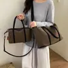 Bolso Tote Versátil de Gran Capacidad Estilo Retro Casual para Mujer 2026 Nuevo Estilo Primavera Bolso de Hombro Cruzado Ligero de Gama Alta