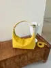 Bolso cruzado francés de nicho simple de mano para mujer 2026 Bolso de hombro de alta gama con diseño de nicho Bolso de hombro único para ir al trabajo