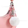 Llavero de Metal Creativo Navideño Transfronterizo Colgante para Bolsa Pompones de Colores Copo de Nieve Elementos Navideños Adornos al por Mayor