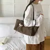 Bolso tote de lona con estampado de leopardo retro de nicho para mujer, nueva colección Otoño 2026, gran capacidad, versátil y adecuado para ir al trabajo