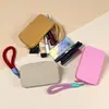 Bolsa de monedas cuadrada de silicona portátil en stock de fábrica, mini bolsa de almacenamiento, bolsa de maquillaje multifuncional