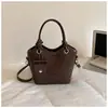 Bolso tipo cubo Shuai Mi Jia estilo coreano para mujer, nuevo bolso de mano de moda verano 2026, bolso cruzado, bolso de hombro simple para ir al trabajo