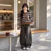 Camiseta de manga larga para niña, nuevo estilo otoño 2026, top corto a rayas para niñas mayores, conjunto de dos piezas de pantalones anchos para niños, moderno