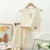 Nuevo conjunto de chaleco para niños conjunto de dos piezas de manga corta para bebé verano gofrado para niños moda Traje para niños moda fabricantes