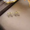 Exquisitos Pendientes Dulces de Lazo Completamente Diamantados, Pendientes de Diseño de Nicho de Moda y Versátiles, Pendientes de Lujo Ligero y de Gama Alta al por Mayor