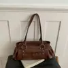 Retro Niche Otoño/Invierno 2026 Nuevo Elegante Versátil Alta Calidad Textura Simple Chic Bolso Almohada de Hombro Único de Mano