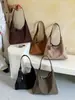 Bolsa tote grande de estilo coreano vintage transfronteiriça para mulheres, bolsa simples mãe e filha outono 2026, bolsa de ombro e axila para o dia a dia