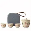 Set de Viaje de Té Cerámico Dunhuang Apsaras Voladoras Una Tetera Tres Tazas Taza Portátil de Preparación Rápida Bolsa de Almacenamiento para Souvenir de Negocios