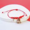 Pulseira de corda vermelha de Ano Novo Yiwu, pequena mercadoria, joia feminina por atacado, pulseira de cerâmica vermelha fofa e artística com temperamento doce.