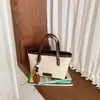 Bolso Retro Transfronterizo para Mujer 2026 Nuevo Otoño Invierno Gran Capacidad Hombro Único Cruzado Bolso Cubo Sencillo Casual