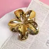 Clip de flor de plumeria transfronterizo de Europa y Estados Unidos, horquilla de flor de bauhinia, festival de alta gama para mujer, clip de tiburón para la parte posterior de la cabeza, accesorios para el cabello