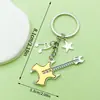 Venta Caliente Transfronteriza Cinta de Música Antigua Saxofón Órgano Llavero Diseño Creativo Sentido Colgante de Bolsa Pequeños Accesorios