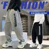 Pantalones Deportivos Casuales Sueltos con Estampado de Letras para Niños Otoño 2026 Estilo Nuevo Pantalones Jogger para Niños de Talla Mediana a Grande para Uso al Aire Libre