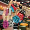 Nuevo Llavero Creativo de Rosa Incrustada con Diamantes para Bolsos de Amazon para Mujer, Accesorios Pequeños Exquisitos de Gama Alta al por Mayor