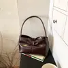 Bolso de mano con lazo de verano 2026 transfronterizo, bolso de hombro moderno y simple para el trabajo, bolso personalizado para el antebrazo
