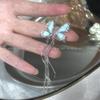 [Fantasma da Ópera Azul] novos brincos de borboleta azul-creme com franja de pérola, brincos de clipe de orelha doce, cool, para garota popular