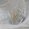 Ins design de nicho simples estilo frio Inglês letra M colar titânio aço bambu clavícula cadeia fêmea 18K banhado a ouro