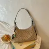 Bolso de Axila para Mujer 2026 Nuevo Estilo Coreano Súper Popular Simple Versátil de Gama Alta para Viajar Bolso de Hombro de Moda Diseño de Nicho