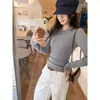 Suéter deslumbrantemente hermoso con cuello redondo calado, camiseta base tejida para mujer, nuevo top interior ajustado para el invierno de 2026