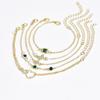 Pulsera de Diamante con Figura de Ocho de Amor Hueca de Venta Caliente Transfronteriza Europea y Americana Pulsera de Múltiples Piezas de Lujo Ligero Esmeralda