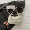 Nova bolsa de ombro feminina da moda transfronteiriça 2026, bolsa versátil para ombro e transversal com corrente, estilo simples e chique