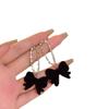 Aretes de lazo retro francés largos con clip para la oreja sin perforación nuevo temperamento moderno Hepburn popular en línea populares aretes femeninos