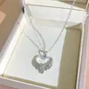 Novo produto transfronteiriço: Colar feminino simples e único com microincrustação de diamantes, design fresco, popular online, acessório de corrente para clavícula requintado